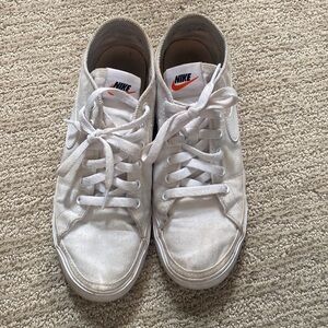 White Nike tennis shoes